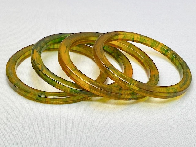 BS36 set of four sliced applejuice inkspot bakelite spacer bangles